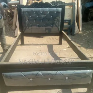 4x6 Gray Leather Bed With 3 Buttons at the Back