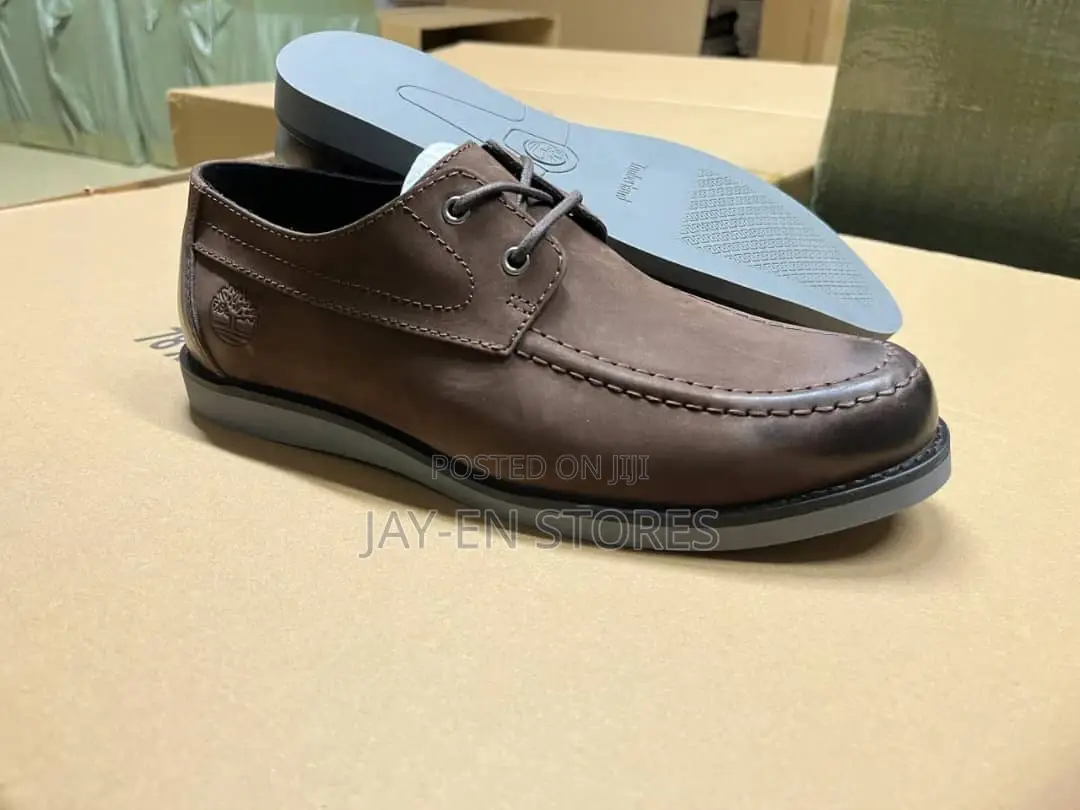 Brown Timberland With a Draw String Closure