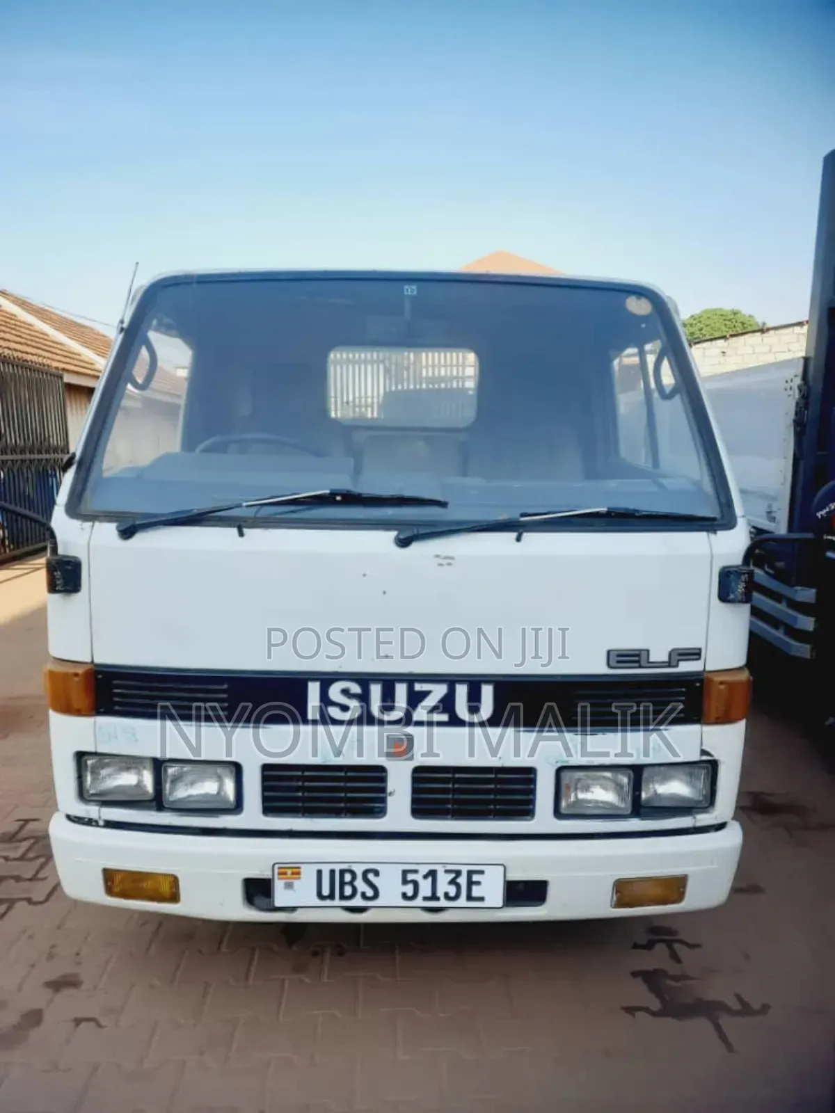Isuzu Elf Tipper White