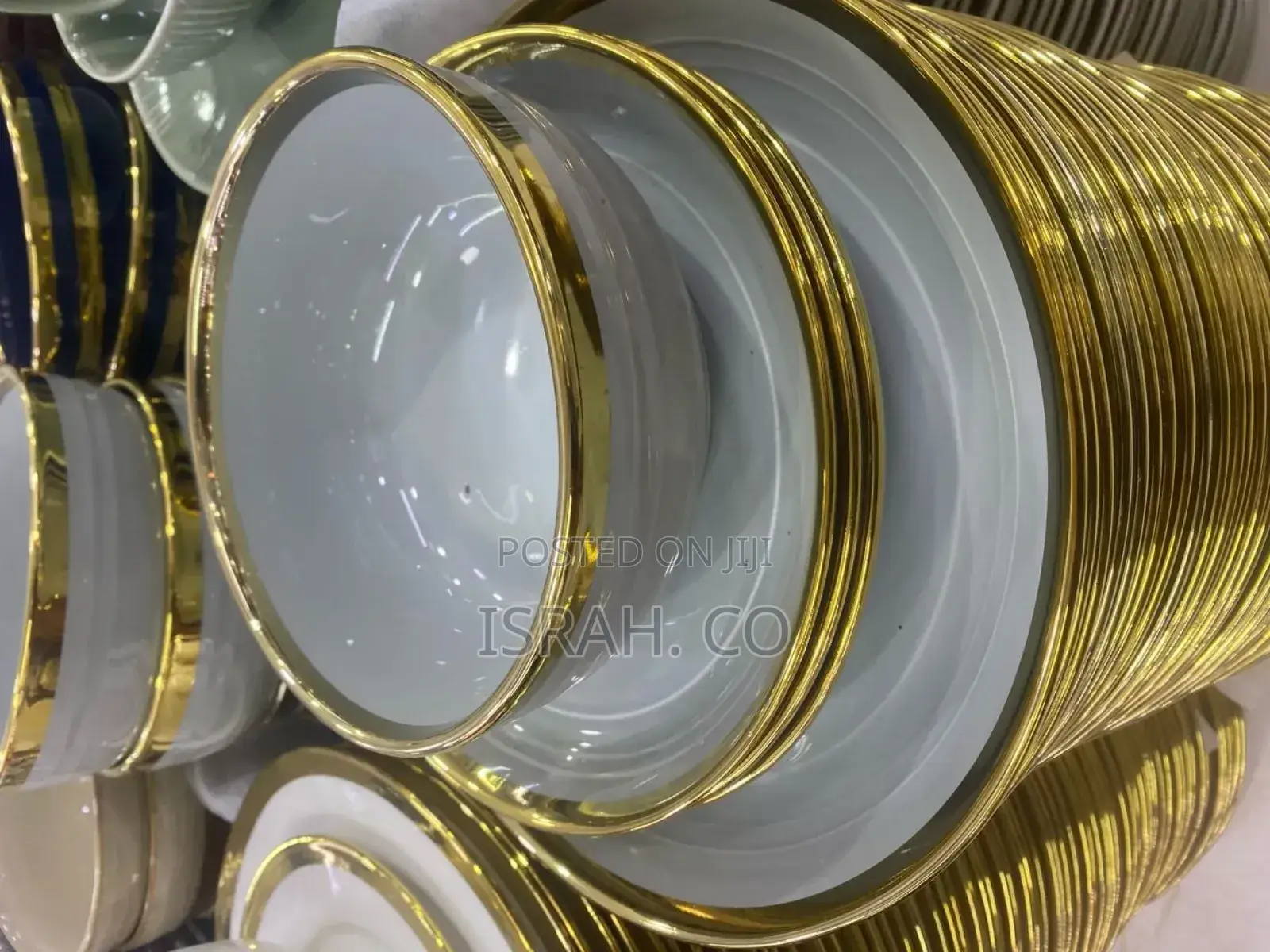 Stack of Dinnerware,Plates and Bowls, With a Gold