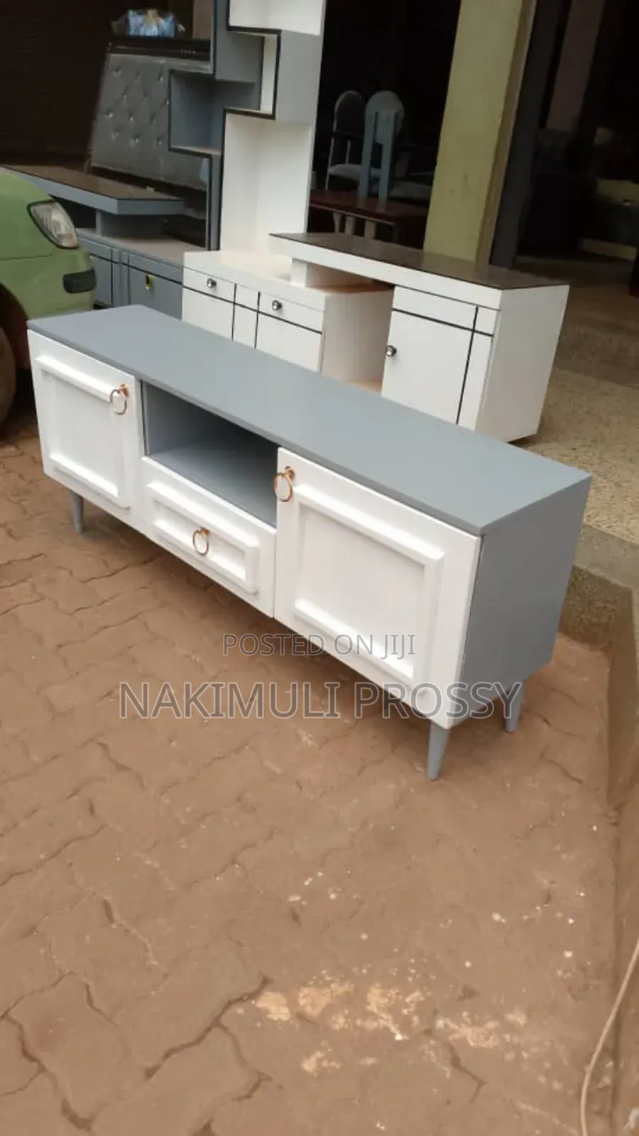 White and Gray Flat Tv Stand With Gold Round Handles