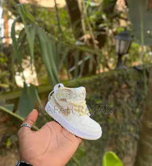 Photo - Original Cream Kid’S Nike Air Jordan 1 High Kid’S Sneakers