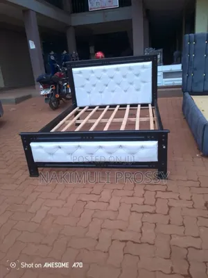 5by6 White Leather Bed With v Shaped Buttons on Back