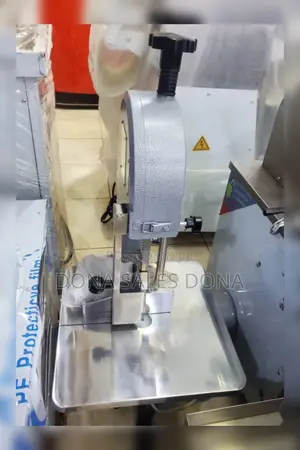 Photo - Bone Saw Machine Supper