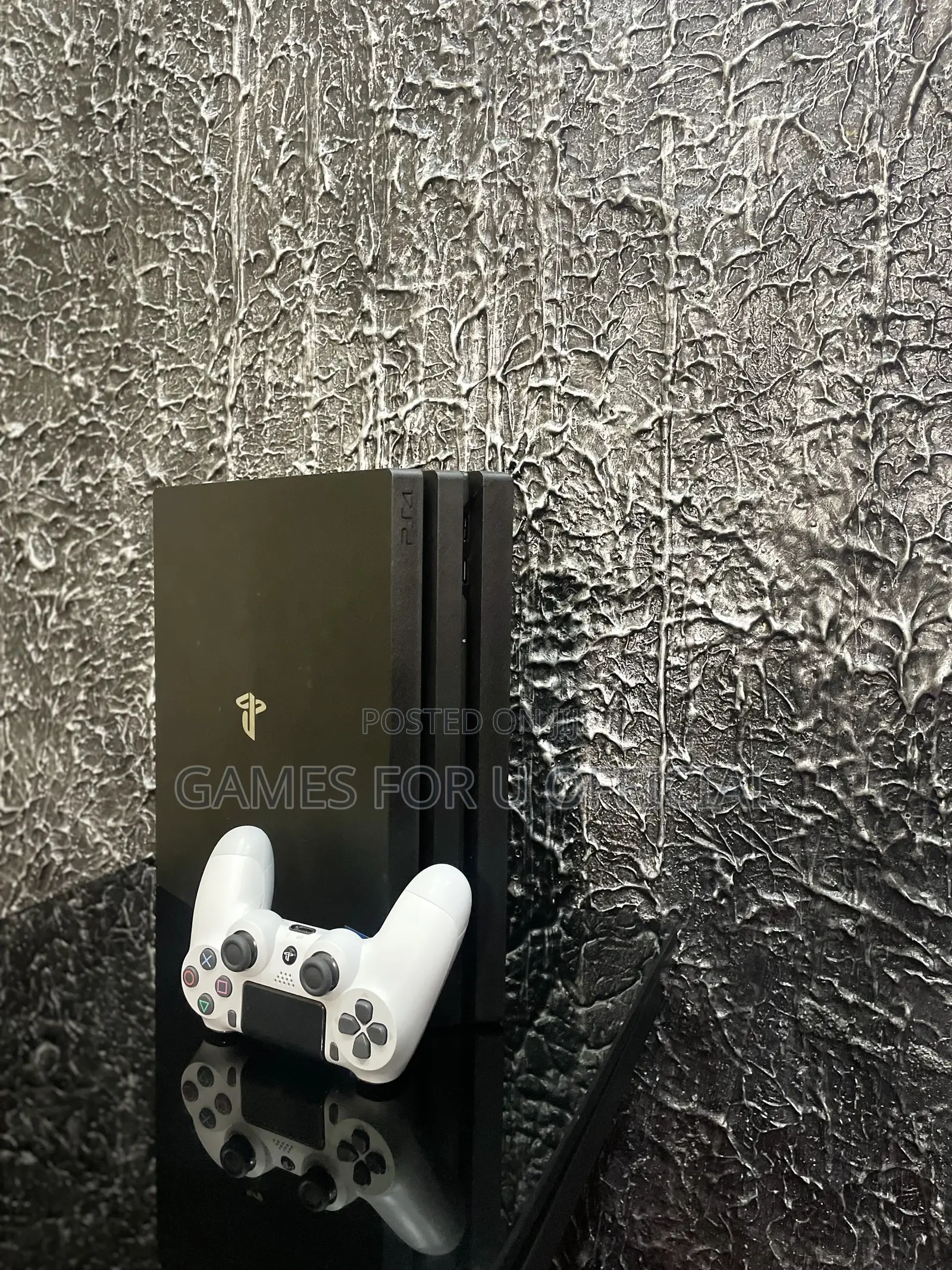 Ps4 Pro Console With a White Pad 889