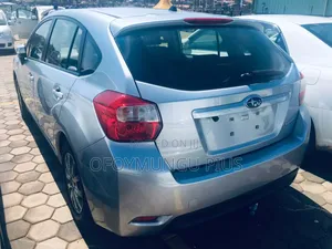 Subaru Impreza 2.0i Limited PZEV 4dr Hatchback AWD (2.0L 4cyl CVT) 2015