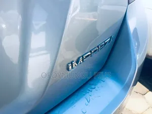 Subaru Impreza 2.0i Limited PZEV 4dr Hatchback AWD (2.0L 4cyl CVT) 2015