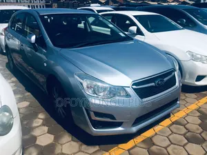 Subaru Impreza 2.0i Limited PZEV 4dr Hatchback AWD (2.0L 4cyl CVT) 2015