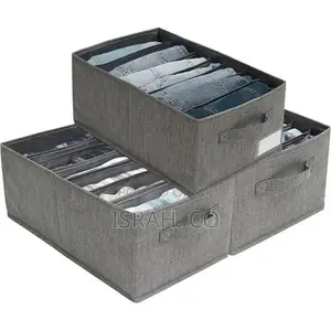 A Set of Three Gray Fabric Closet Organizers,