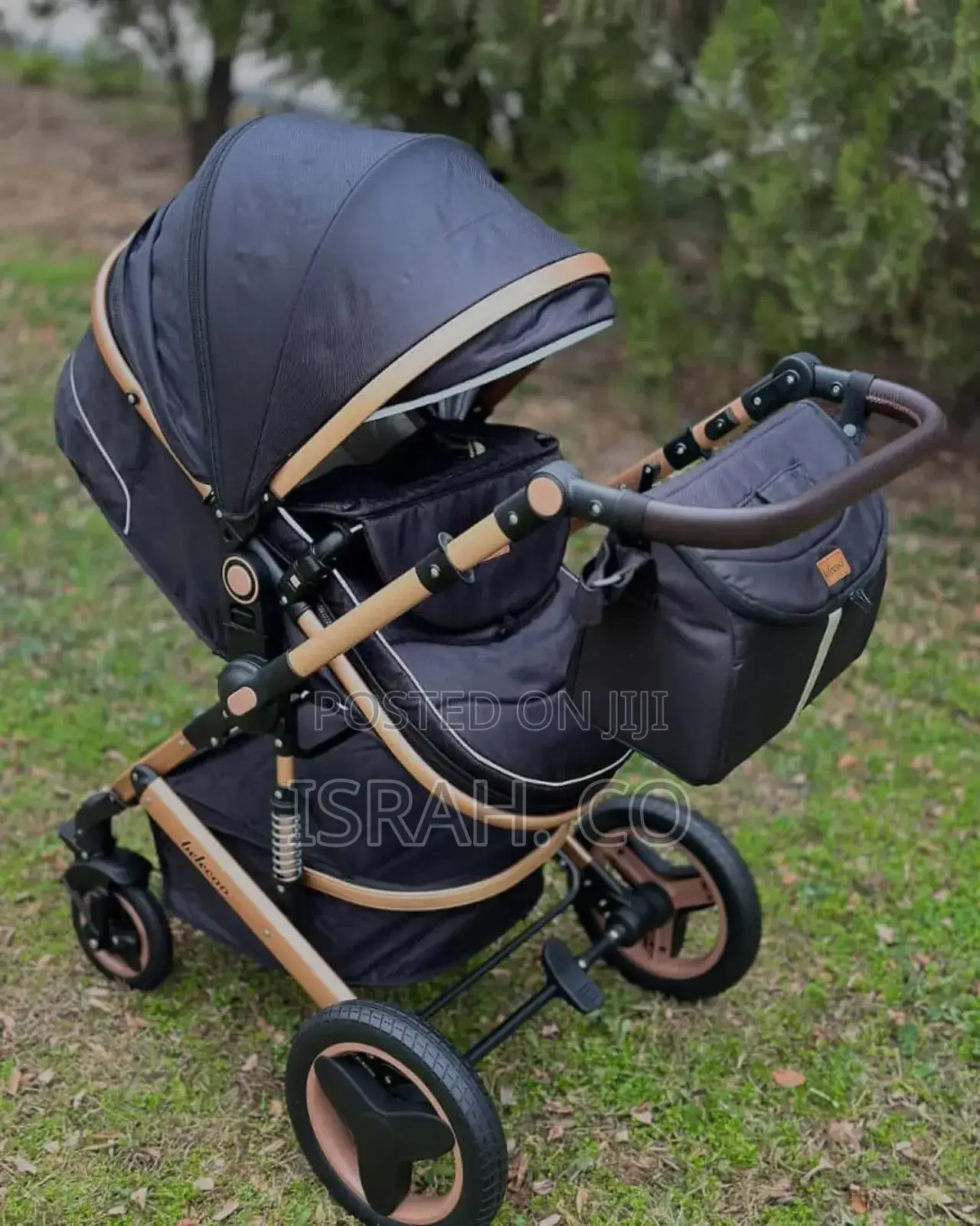 Luxmom 518 3-in-1 Stroller in Black and Gold.
