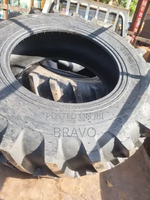 16.9 - 30 Tractor Tyres Behind.