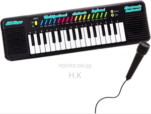 Photo - 32 Keys Electronic Keyboard Toy