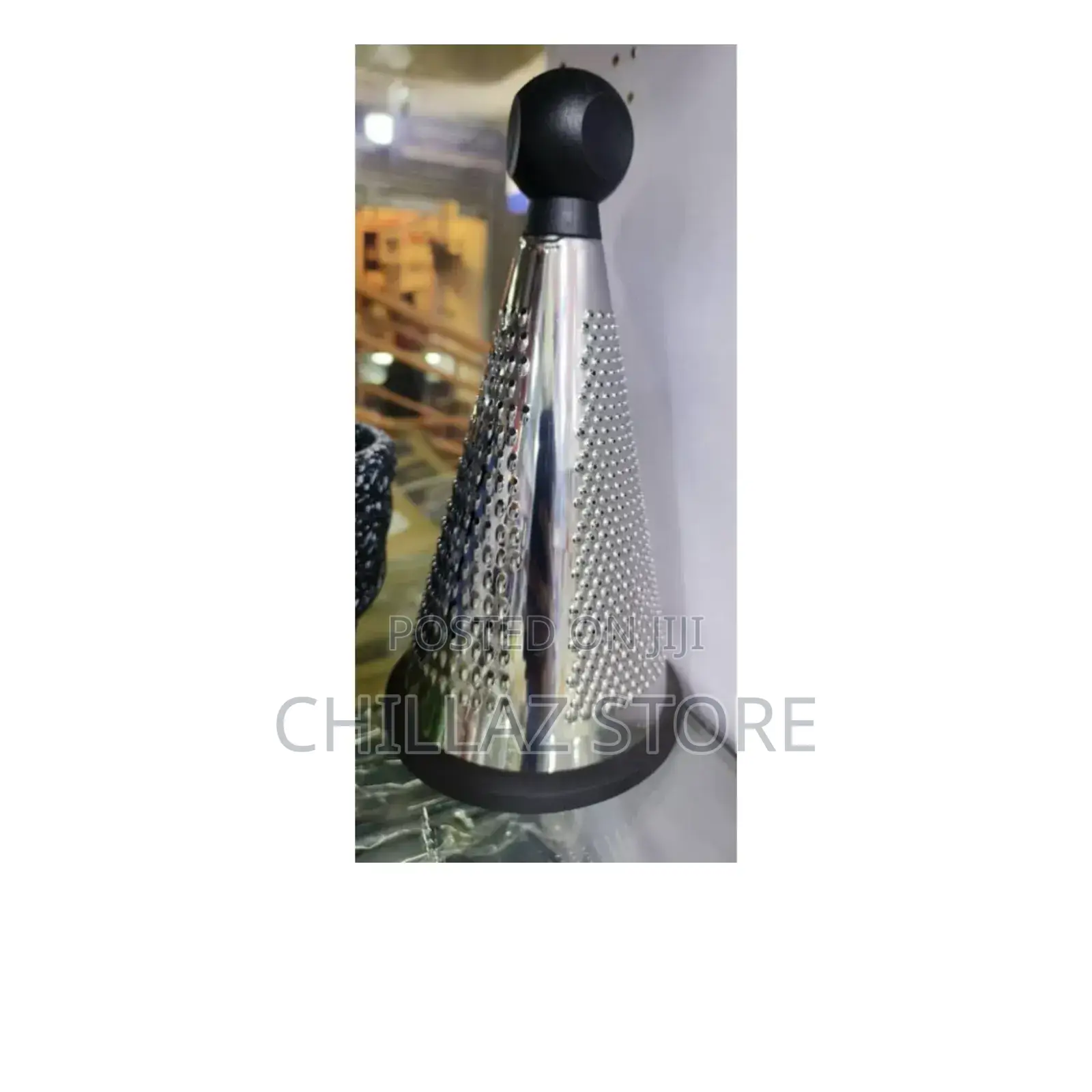 Vertical Cone Shaped Cheese Grater.