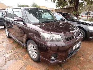 Photo - Toyota Corolla Rumion Hatchback 1.8 FWD 2009 Brown