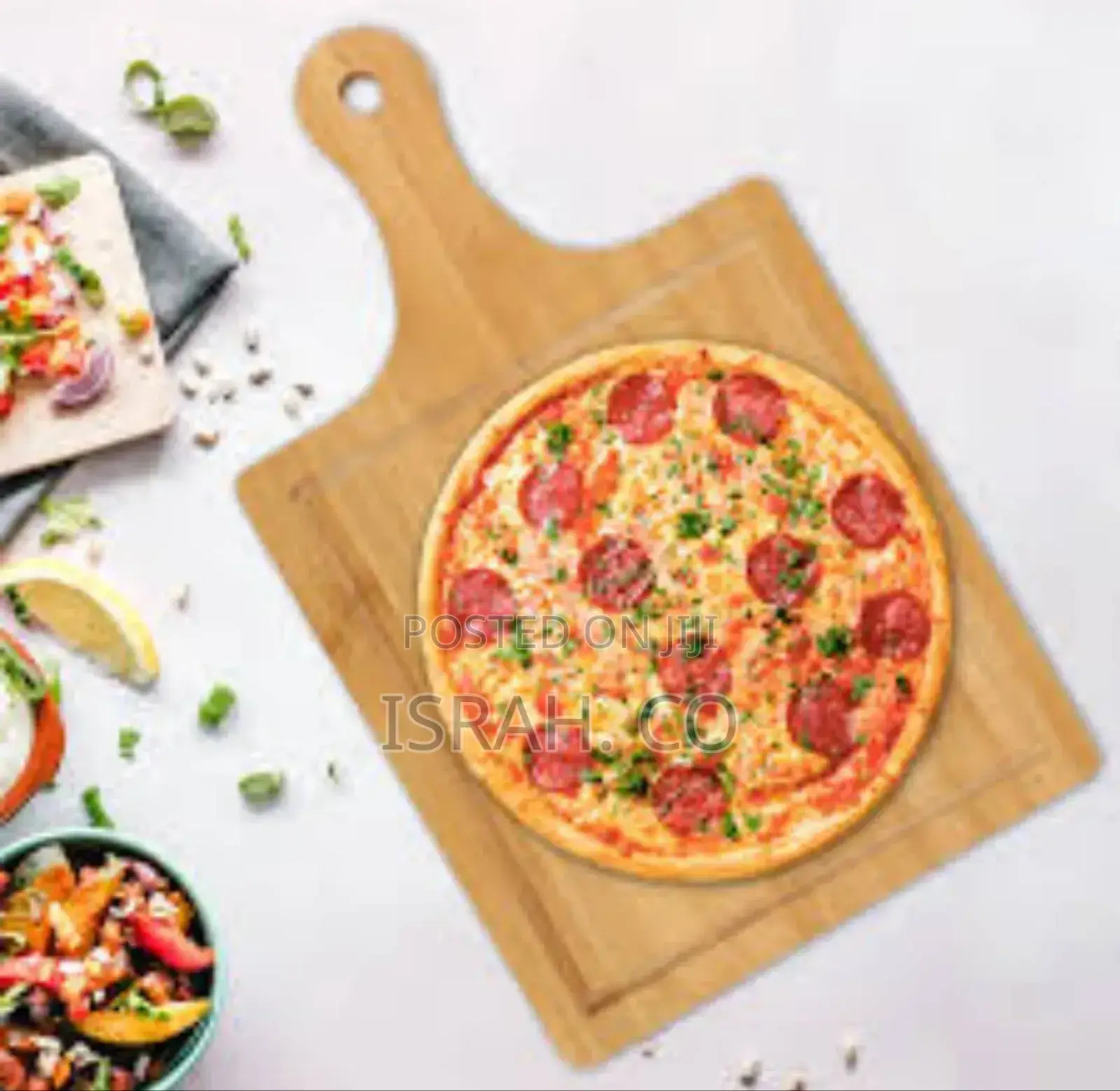 A Pepperoni Pizza on a Wooden Pizza Board.