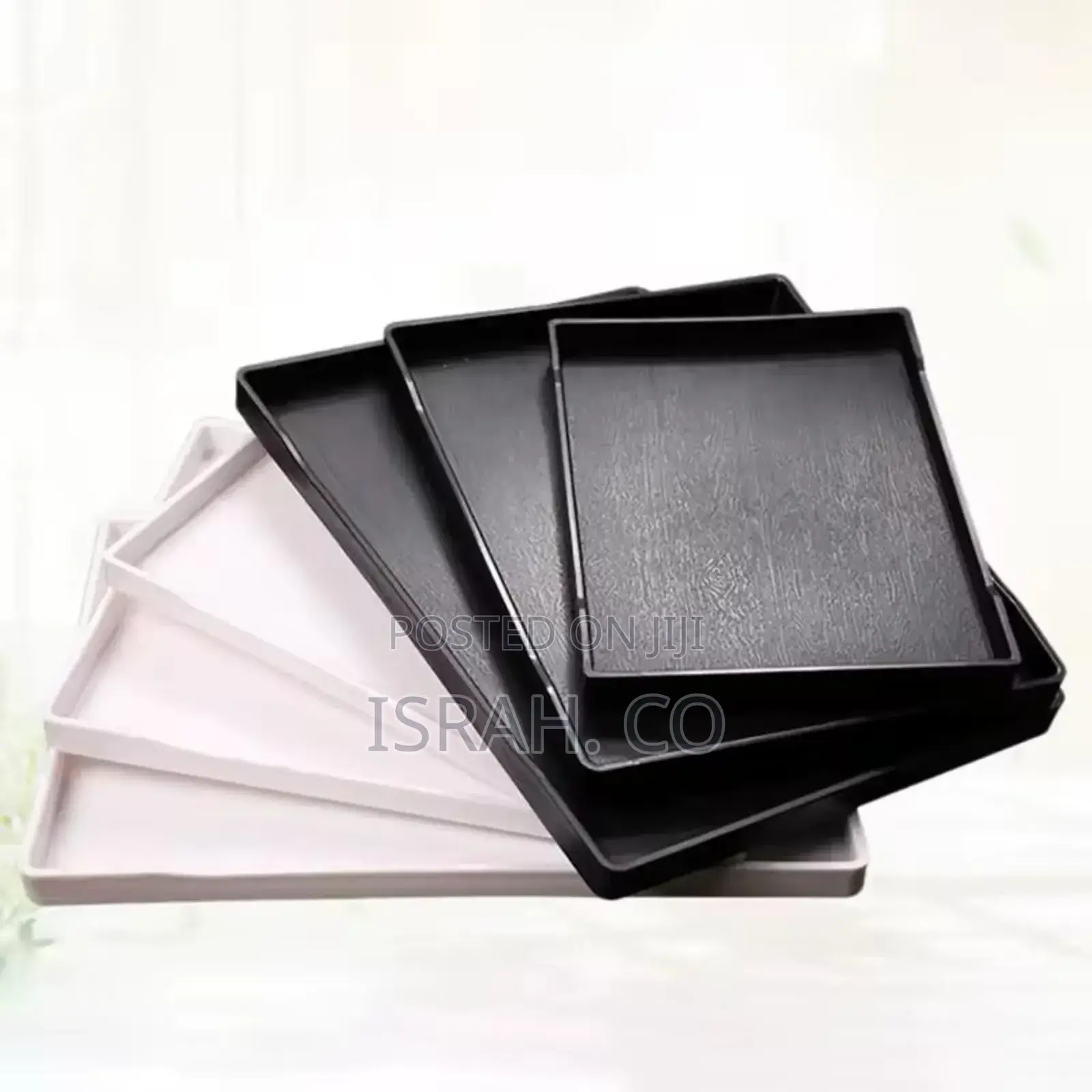 Stack of Black and White Rectangular Melamine Trays