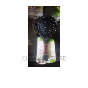 Photo - Nunbell Double Sided Pet Grooming Brush.