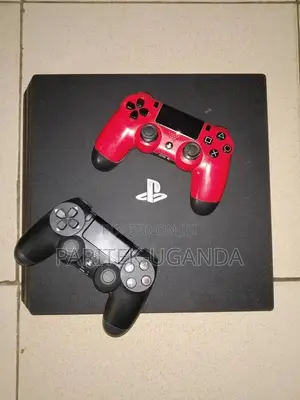 Playstation 4 Pro W/ 10 Games/02 Controllers/500gb Hdd