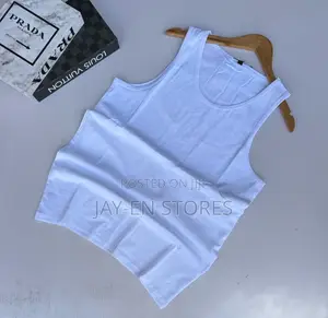Plain White Vests Available