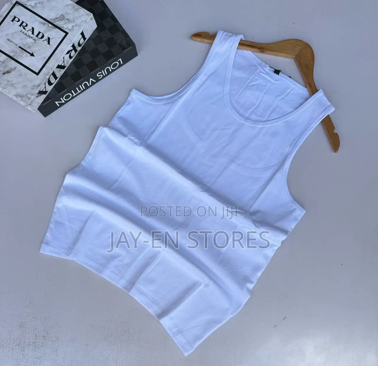 Plain White Vests Available