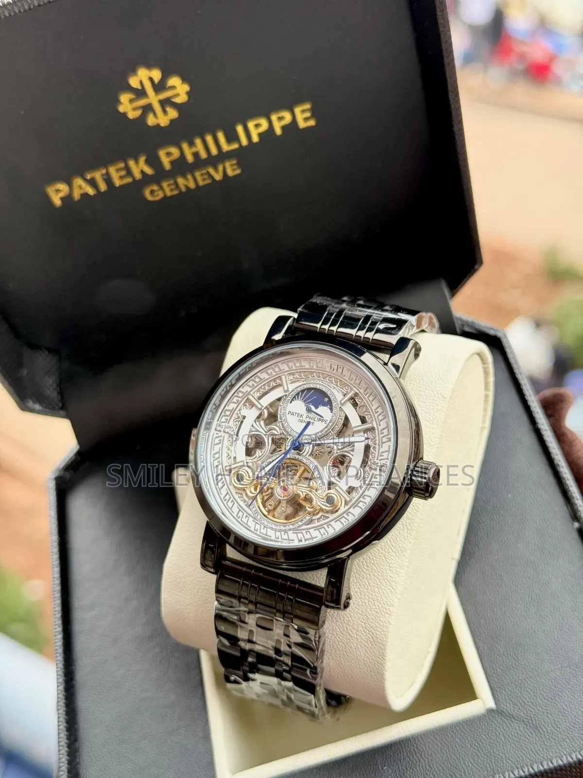 Patek Phillipe Matte Black Wrist Watch With a White Face