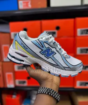 New Classic Men's New Balance 740s Sneakers in Stock