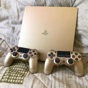 Playstation 4 Slim. Chipped With 12 Games and 2 Controllers