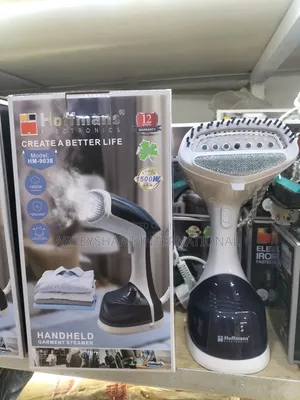 Hoffmans Handheld Garment Steamer, Model Hm-9038.