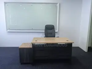 The Brown/ Office Table/ Has/ Started a Rock /