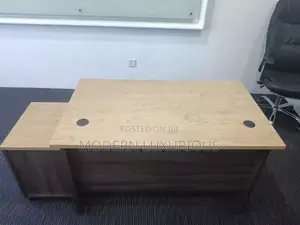 The Brown/ Office Table/ Has/ Started a Rock /
