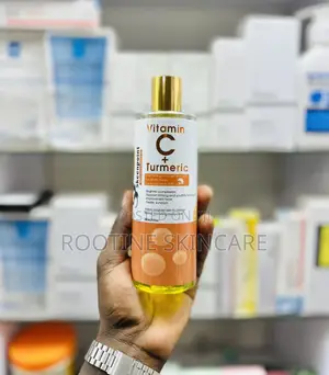 Photo - Skeen Point Vitamin C + Tumeric Face Body Brrightening Oil