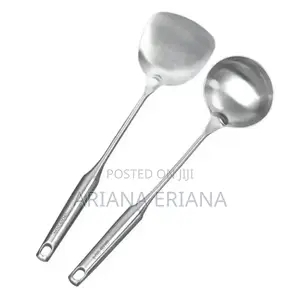 Photo - Apair of Aluminum Spoons