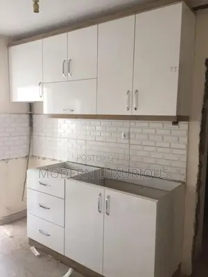 Clean Lines, Layered Textures,And Timeless Kitchen Cabinets