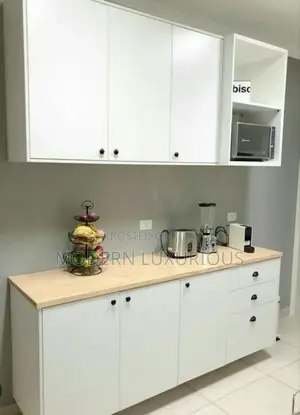 White on White. Neatly/ Done! Modern/ Kitchen Cabinets/