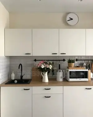 White on White. Neatly/ Done! Modern/ Kitchen Cabinets/