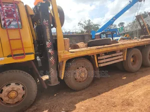 Low Bed Heavy Machinery Carrier for Rent/Hire.
