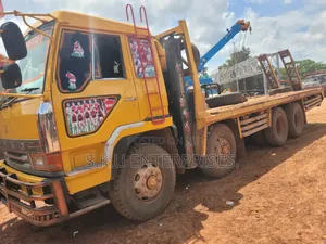 Low Bed Heavy Machinery Carrier for Rent/Hire.