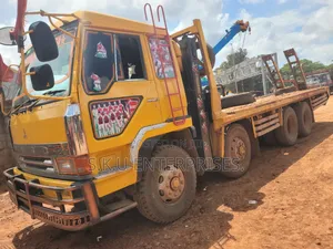 Low Bed Heavy Machinery Carrier for Rent/Hire.
