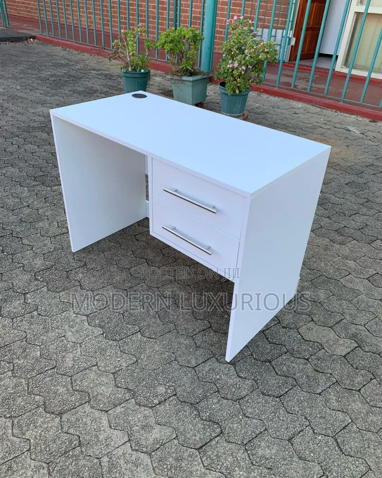 Minimalist Work. Office Desk With Vertical Inverted Legs.
