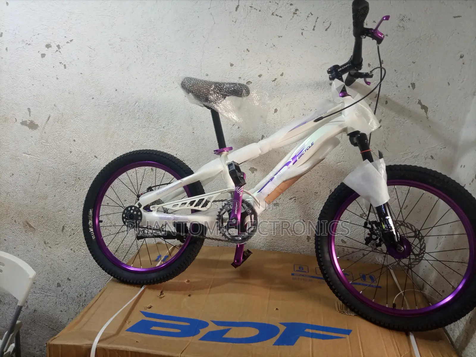 Brand New White Bicycle With Purple Rims