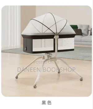 Photo - Portable and Foldable Baby Bed