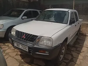 Photo - Mitsubishi L200 2004 White