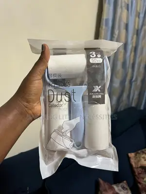 Portable Lint Remover/Roller With 2 Refills (50 Sheets)