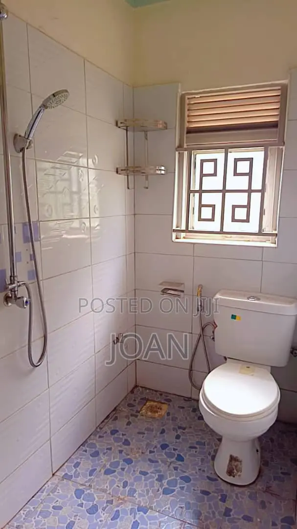 100/100ft Plot With a House Title in Kajansi at 120m