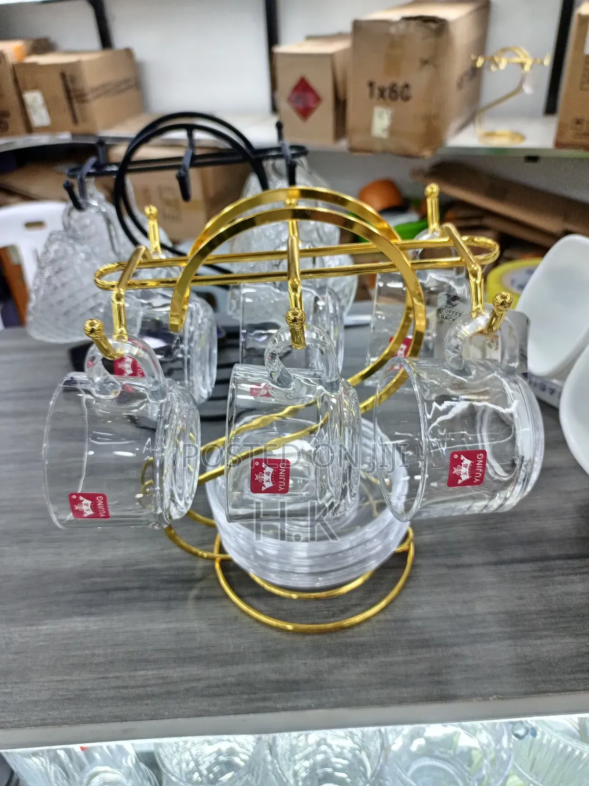 Glass Teacups and Saucers + Gold-Colored Metal Stand.