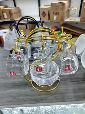 Glass Teacups and Saucers + Gold-Colored Metal Stand.
