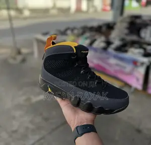 Original Air Jordan 9 Retro “University Gold” Sneakers