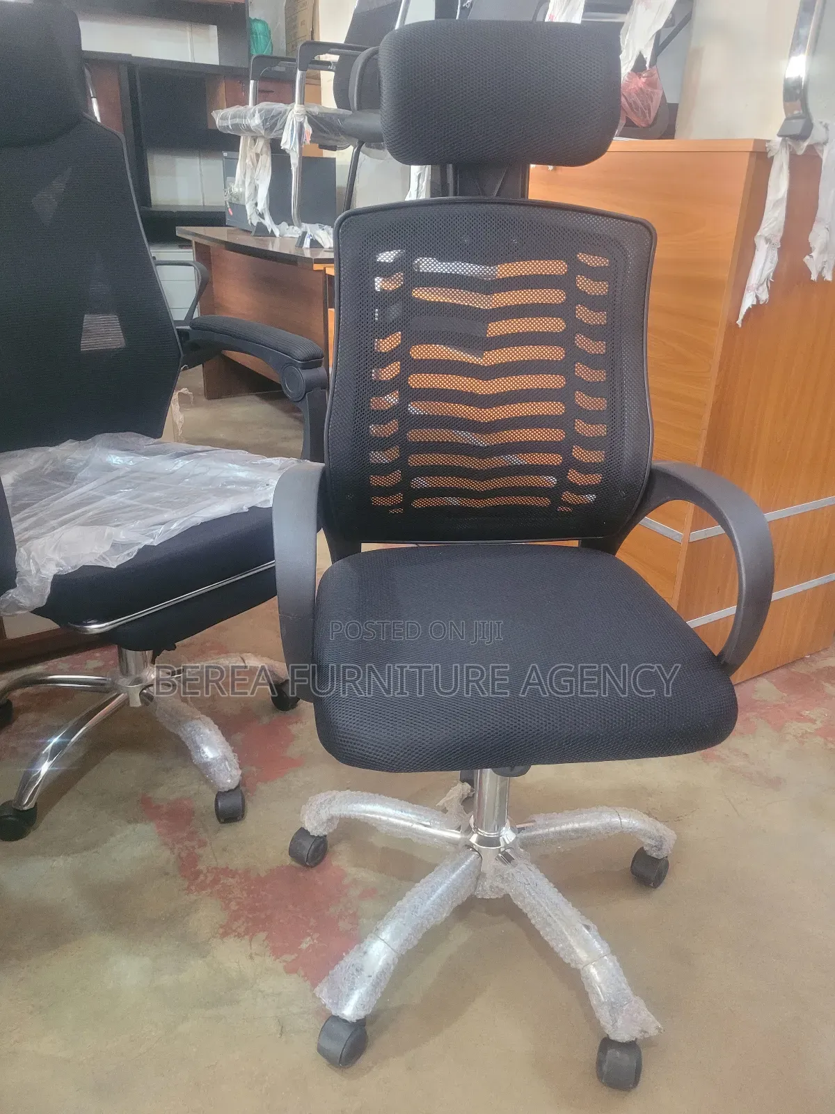 Brand New Mesh Swiveling Office Chair With Headrest