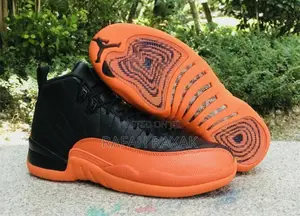 Classic Black/Orange Nike Air Jordan 12 Retro Sneakers