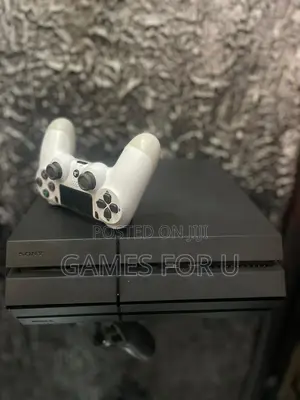 Ps4 Standard Black Console and White Pad With Games